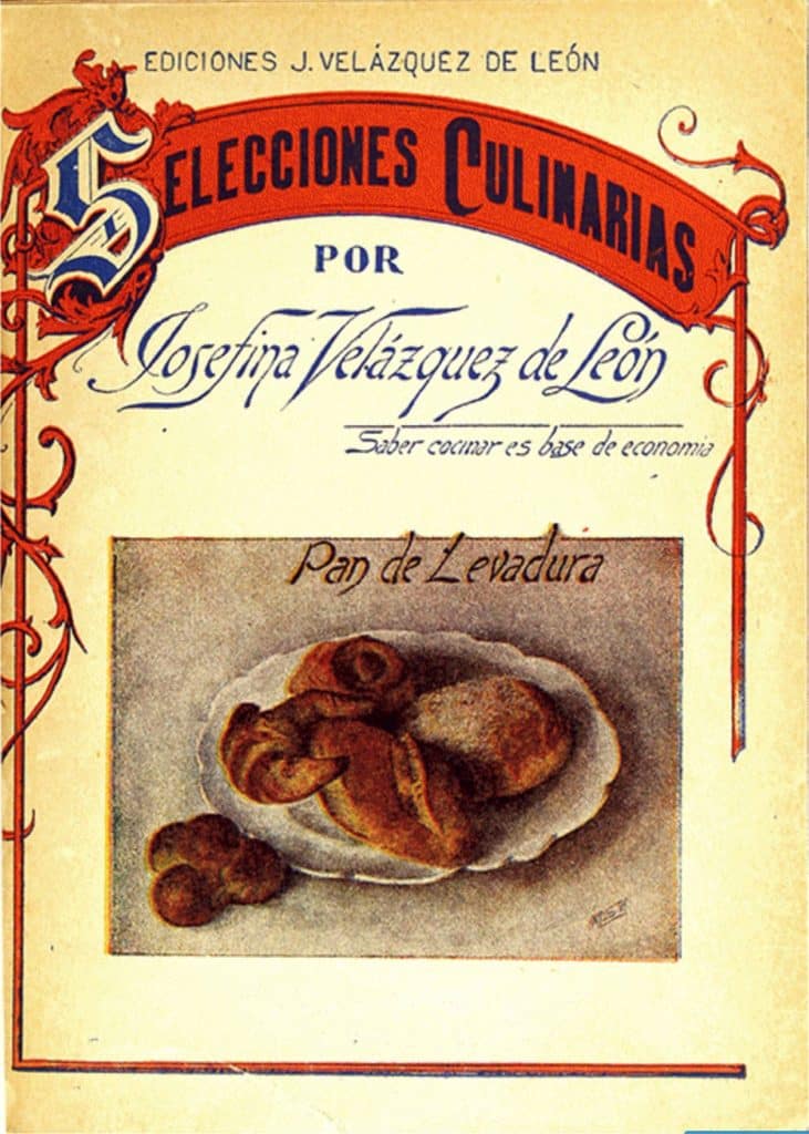 cookbook cover, a plate of bread on a white table cloth