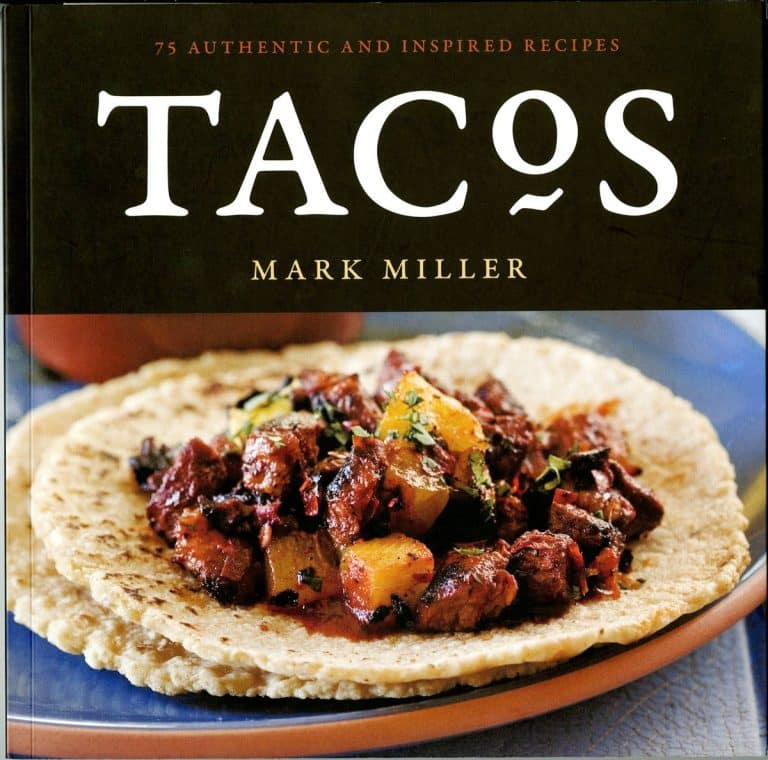 tacos book cover with a tacon filled with meat on a blue plate.