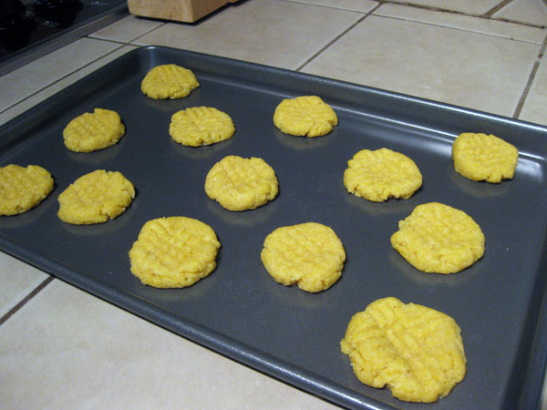 cornmeal cookie dough balls flattened