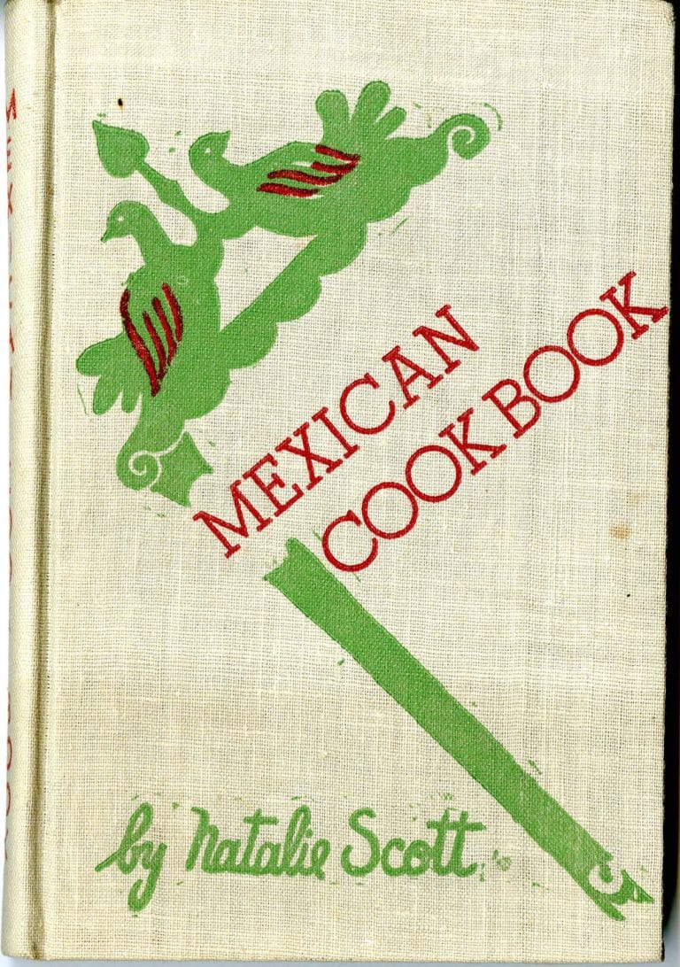 white book cover with two green birds