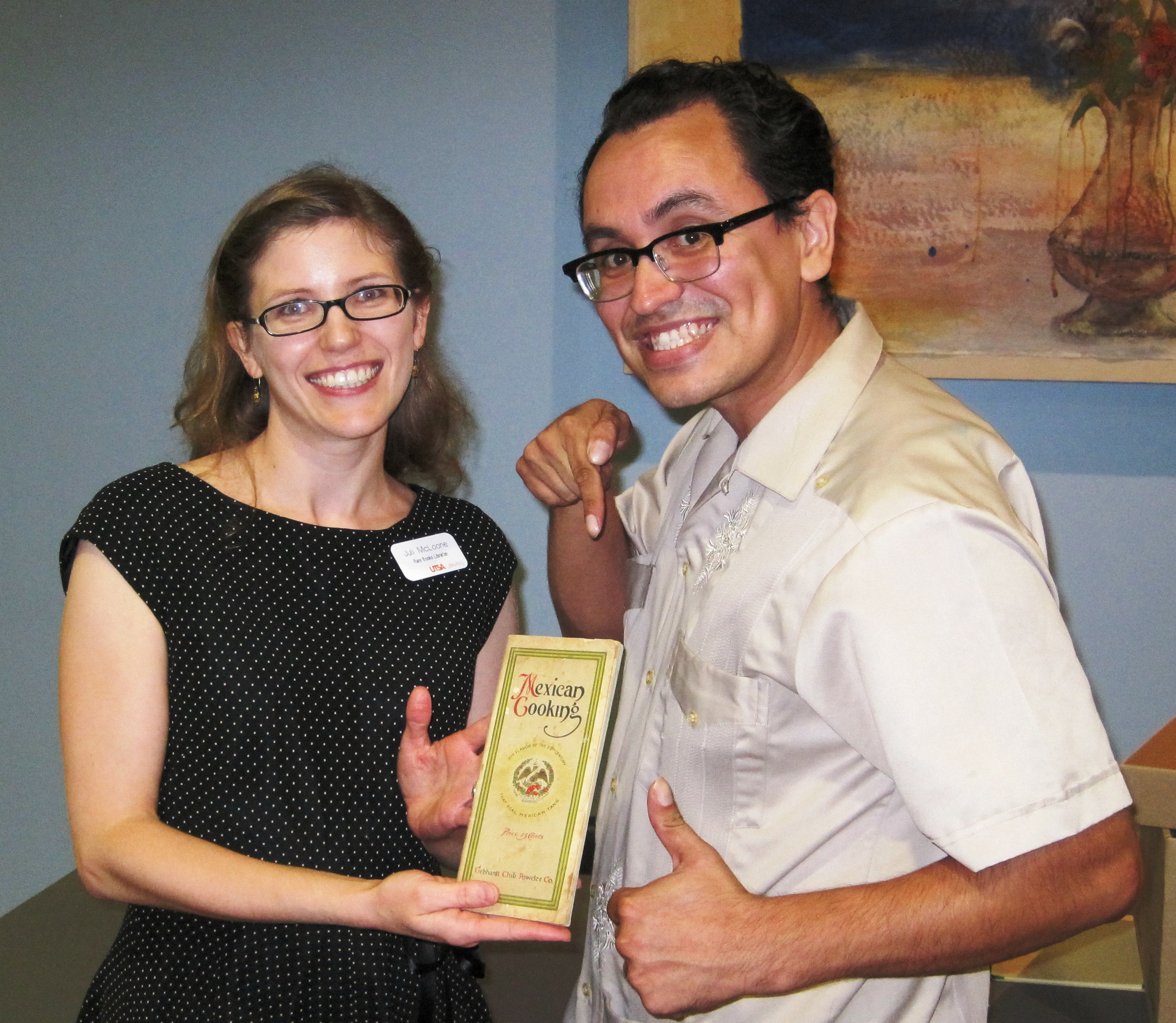 Gustavo Arellano, author of Taco USA, with rare books librarian Juli McLoone and Gebhardt's Mexican cooking : the flavor of the 20th century (1911)